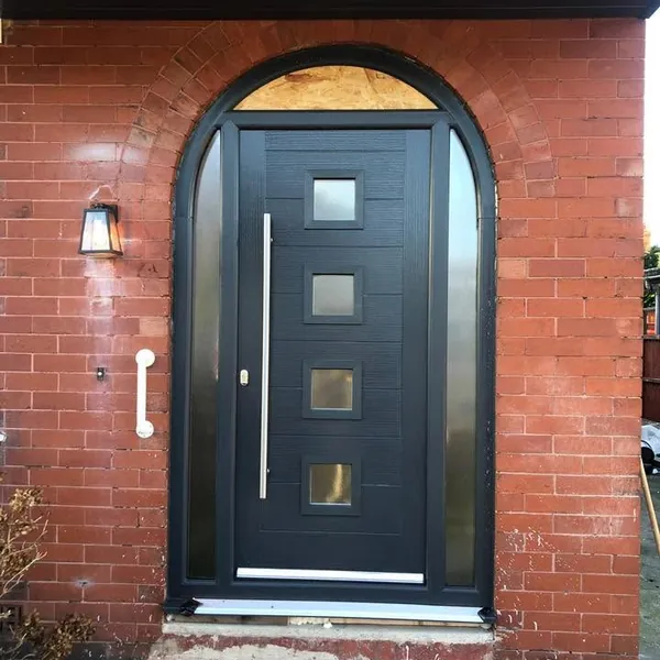 Arched black composite door with glazed panels