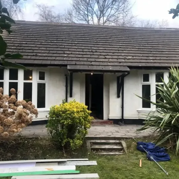 White uPVC bay windows across a bungalow front