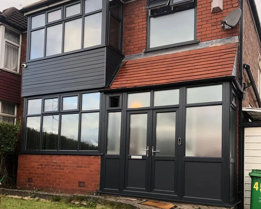 A house fitted with new anthracite grey windows and doors